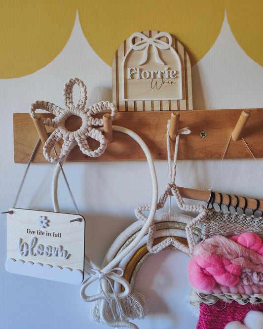 Personalised striped arch with bow plaque