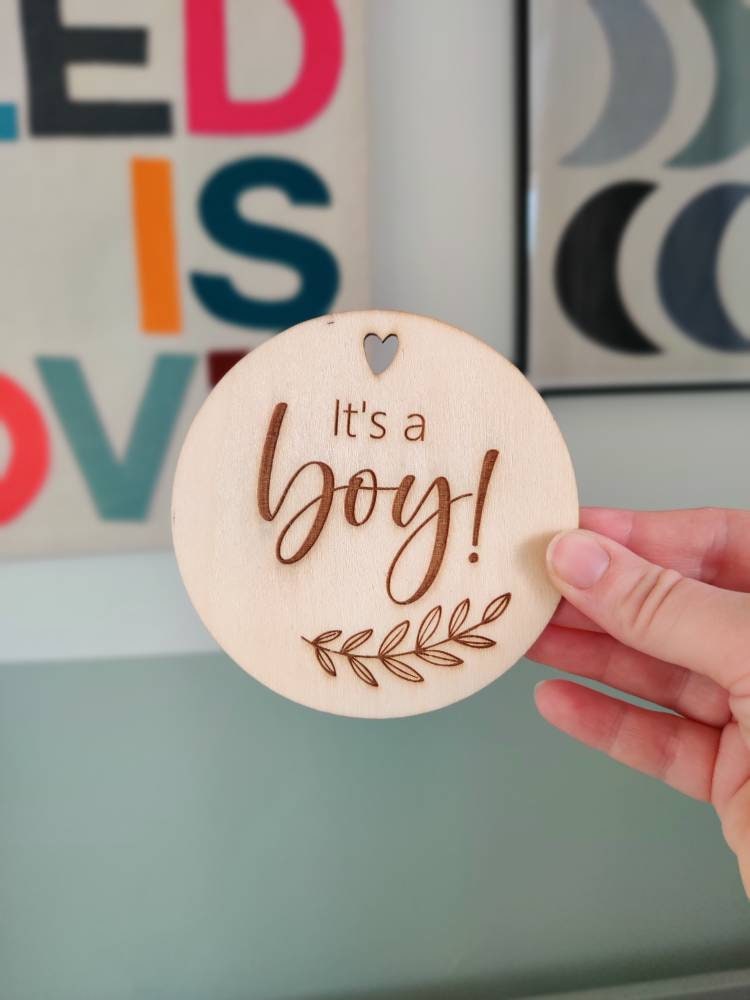 It's a boy wooden disc