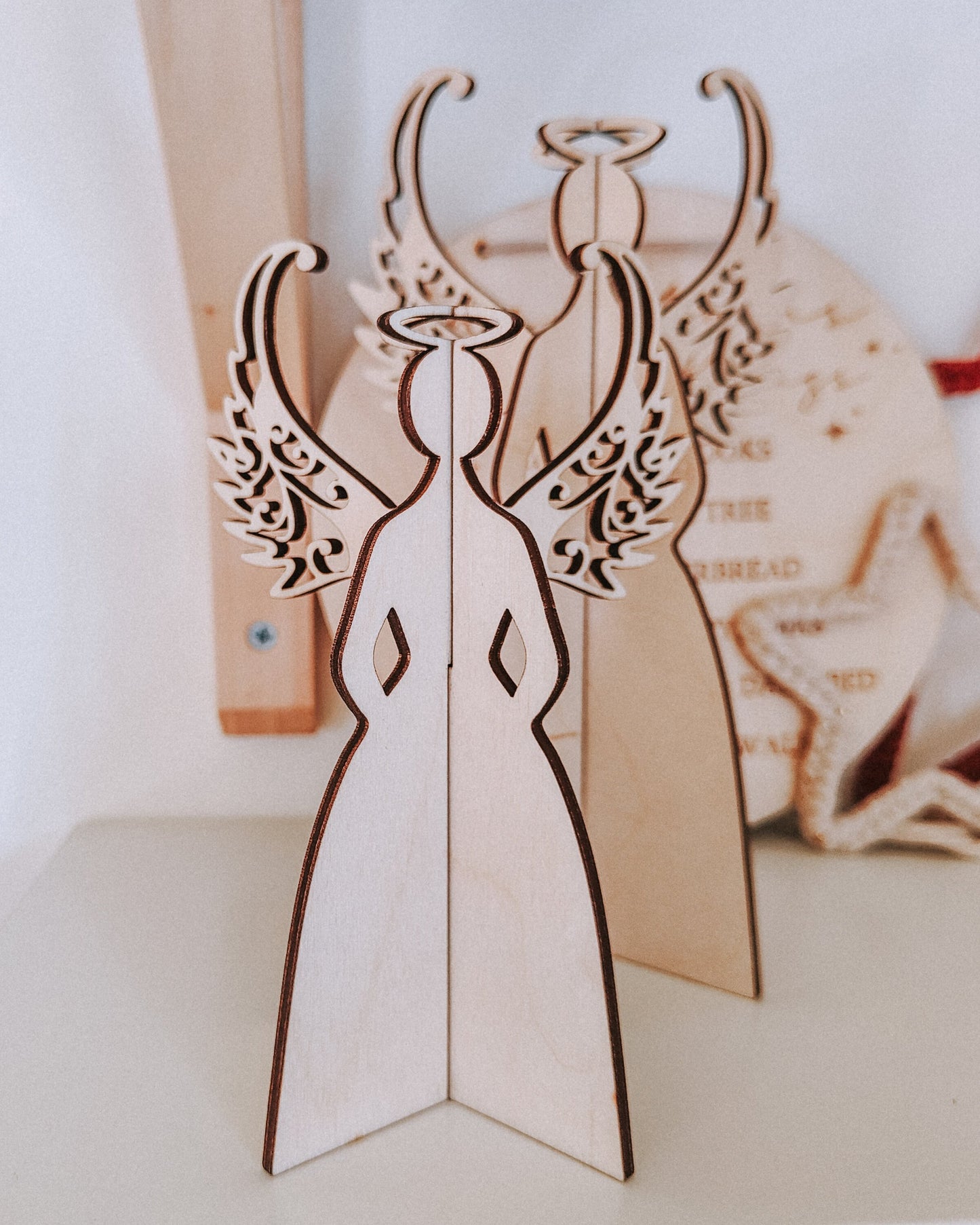Interlocking wooden Christmas angel