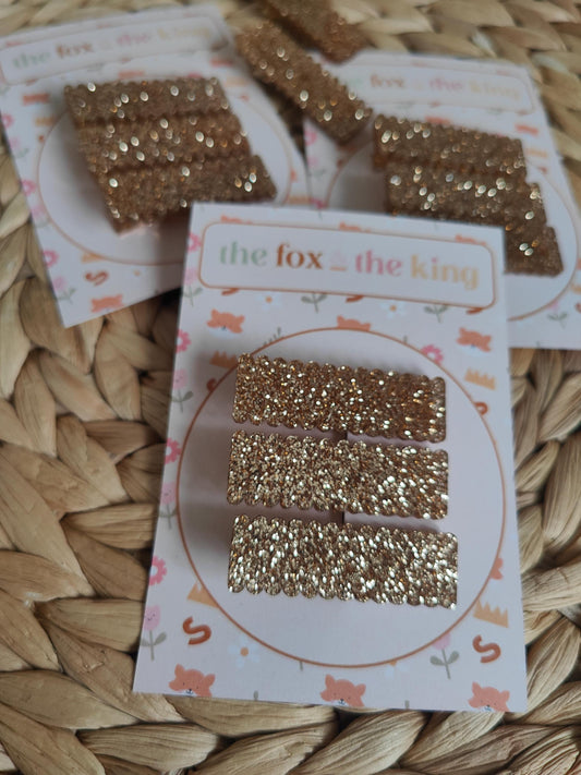 Sparkly acrylic scallop edge hair slides