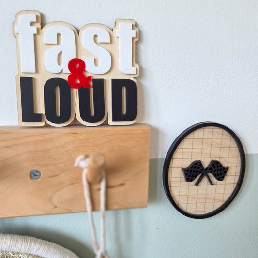 Checkered racing flag oval plaque
