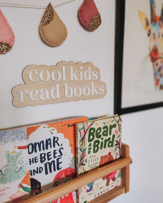 Cool kids read books sign