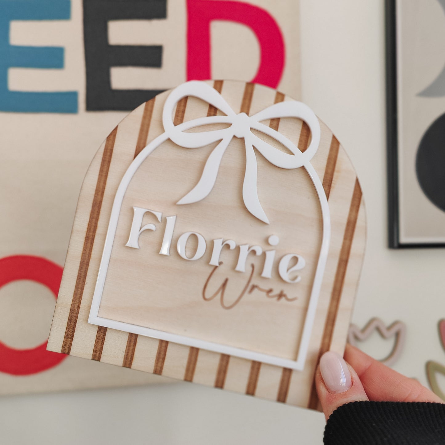 Personalised striped arch with bow plaque