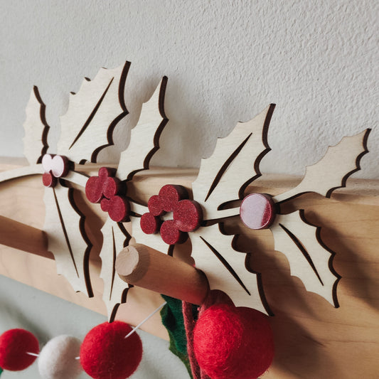 Wooden holly branch