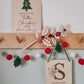 Wooden holly branch