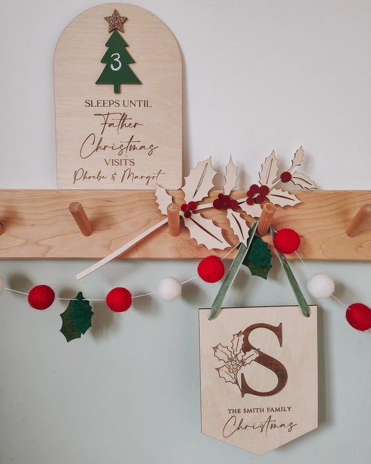 Wooden holly branch
