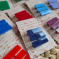 School colour acrylic scallop edge hair slides