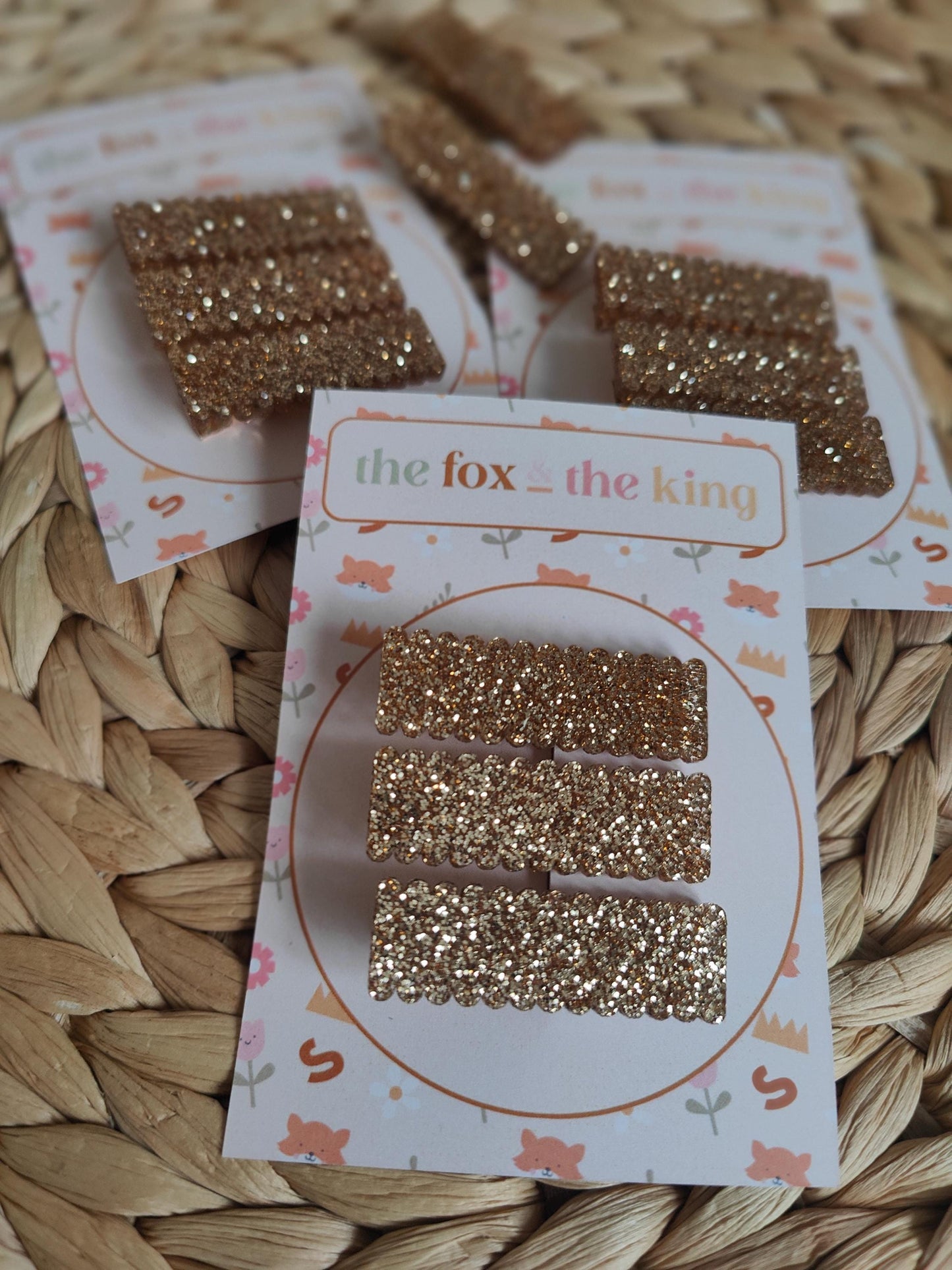 Sparkly acrylic scallop edge hair slides