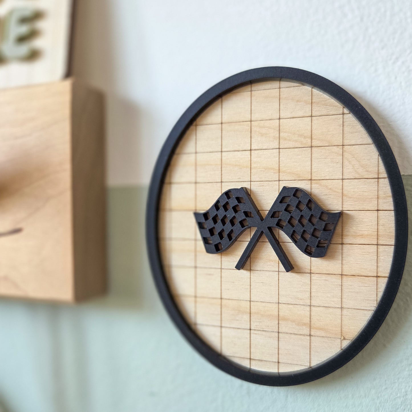 Checkered racing flag oval plaque