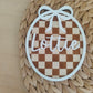 Personalised chequer board and bow name plaque