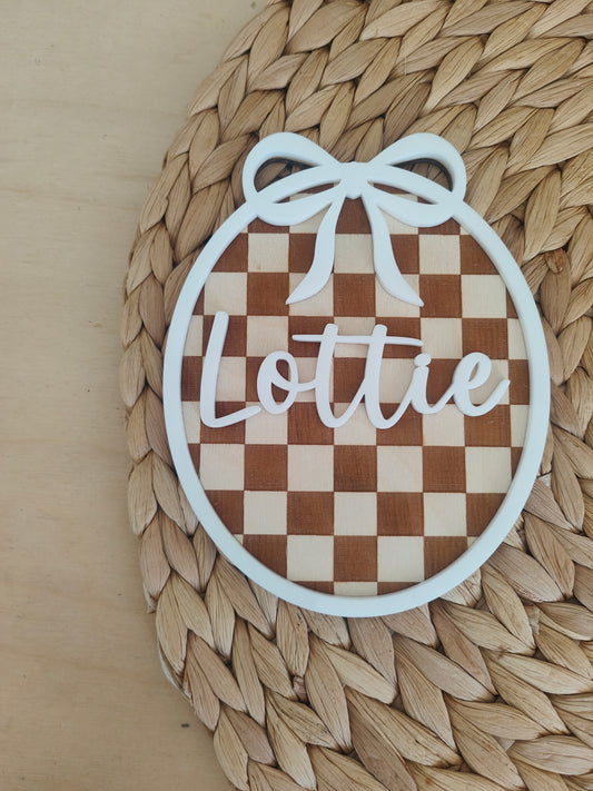 Personalised chequer board and bow name plaque